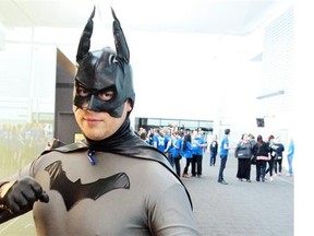 Joss Hnatiuk is dressed up as an old-school Batman at Edmonton Comic and Entertainment Expo on Sept. 27, 2014.