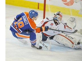 Justin Schultz (19) of the Edmonton Oilers scores on Braden Holtby of the Washington Capitals at Rexall Place in Edmonton.
