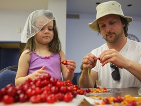 Kevin Kossowan, seen here with his daughter Evelyne, has just released a new video about the Slow Food movement in Canada.