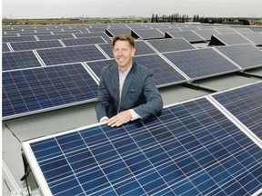 Kyle Kasawski, general manager, Landmark Power, on the rooftop of the Landmark Group building at 1103 95 St. S.W. in Edmonton. The building is partially powered by 510 rooftop and awning solar panels.