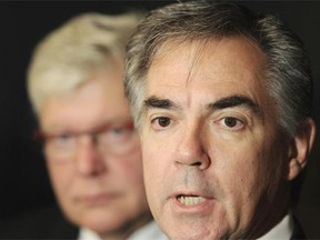 New leader Jim Prentice and Premier Dave Hancock speak to media before meeting in Government House in Edmonton on Monday Sept. 9, 2014.