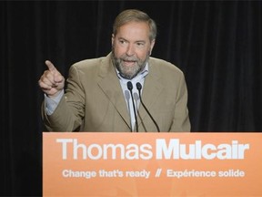 NDP Leader Thomas Mulcair speaks at the federal NDP caucus meeting at the Fairmont Hotel Macdonald in Edmonton on Sept. 10, 2014.