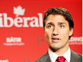 Liberal Leader Justin Trudeau gives his closing comments to media at the federal Liberal summer caucus meeting in Edmonton on Wednesday, Aug. 20, 2014.