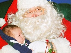 Mall Santa Clauses such as Lou Marta, a Santa school graduate pictured in 1996 working his magic on two-month-old Douglas Dubois at Meadowlark Shopping Centre, were scarce in the city in 1973.