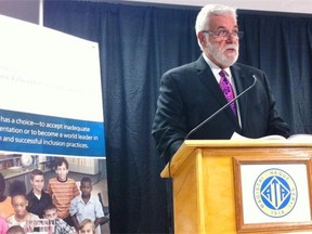 Marc Arnal, chair of a panel that studied inclusive education, speaks to the media at a news conference Wednesday, Sept. 10, 2014.