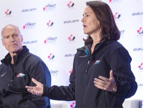 Mary-Kay Messier, right, speaks during a First Shift program in early October 2014, as her brother, NHL great Mark, looks on.