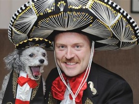 Mike Harding going a little Mexican with his dog Xander, 9, to gain attention for the Movember cause in Edmonton, November 20, 2014. He’s posting daily photos on Facebook of him and his dog posing in costume.