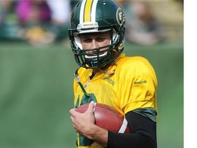 Mike Reilly’s injured thumb kept him from throwing the ball during Eskimos practice at Commonwealth Stadium in Edmonton on Friday Aug. 29, 2014.