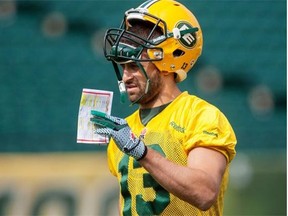 Mike Reilly walks off the turf at Commonwealth Stadium at Edmonton Eskimos practice on Aug. 28, 2014.