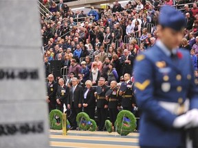 A moment of silent with the cenotaph in the front ground during the Remembrance Day Service ceremony in the Butterdome at the University of Alberta in Edmonton, Nov. 11, 2014.