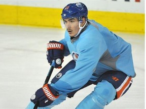 Nail Yakupov puts on the brakes during the Edmonton Oilers’ practice at Rexall Place on Friday, Oct. 31, 2014.
