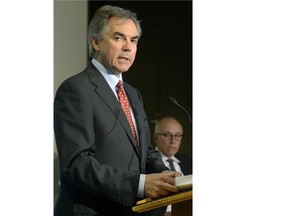 Alberta Premier Jim Prentice (left) and Alberta Health Minister Stephen Mandel (right) announced plans to reduce pressure on hospital emergency rooms and addressed acute and long-term care bed shortages in Alberta. The announcement was made at the Royal Alexandra Hospital in Edmonton on October 14, 2014.