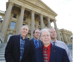 Dr. Alan Lockwood (front), a U.S. expert on disease caused by coal, from left, Colin Soskolne, professor emeritus University of Alberta, Dr. Mishka Lysack professor at University of Calgary and Dr. Joe Vipond, Canadian Association of Physicians for the Environment met with Energy Minister Frank Oberle and the three opposition parties at the Alberta legislature in Edmonton, Sept. 29, 2014.