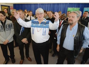David Dorward (middle), Alberta Associate Minister of Aboriginal Relations and Merle White, President of the Alberta Native Friendship Centres Association (right) helped launch an awareness campaign named “The Moose Hide Campaign” at Amiskwaciy Academy in Edmonton on Nov. 24, 2014. The campaign is to raise awareness against violence toward Aboriginal women.