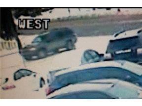 Edmonton police have released video footage of a dark-coloured SUV that struck and injured a postal worker last week.