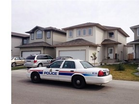Homicide detectives are investigating after a woman died at a house Friday in the Tamarack neighbourhood, at 3731 13th St., in Edmonton.