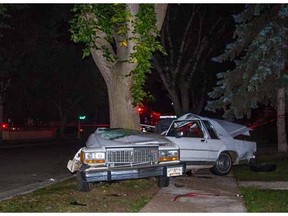 Two men died after a Crown Victoria blew a stop sign, clipped two vehicles and slammed into a tree on Aug. 24, 2014.