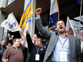 Gil McGowan, president of the Alberta Federation of Labour, speaks to supporters at a rally at the Labour Relations Board hearing in downtown Edmonton where a back-to-work order was issued to corrections officers on April 27, 2013, following a wildcat strike that began Friday.