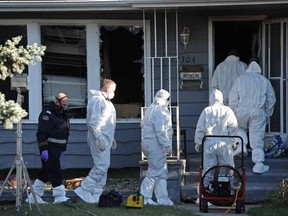 Police and fire investigators were on scene at a fatal fire in Callingwood on Wednesday Oct. 1, 2014.