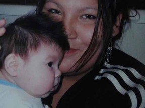 Toni Omeasoo snuggles her daughter, Phoenix, shortly before the baby died in a collapsed bassinett on Jan. 17, 2010.