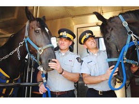 Brothers Const. Derek Quilley, left, and Const. Matthew Quilley talk about why they decided to perform at the RCMP Musical Ride, which takes place at the Whitemud Equine Learning Centre in Edmonton on Saturday, Aug. 30th and Sunday, Aug. 31 2014.