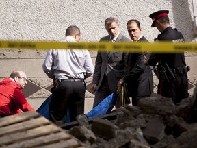 Homicide detectives and the medical examiner have examined the remains found in the front yard of a home that is under construction on 102nd Street near 132nd Avenue and have confirmed them to be animal remains, not human remains on September 3, 2014.