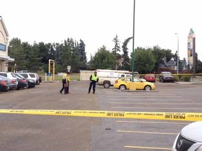 Edmonton police are investigating after a woman was injured jumping out of a moving vehicle at a strip mall parking lot in the city’s north end Tuesday morning.