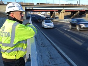 Byron Nicholson, director of special projects with Edmonton's roads design and construction department, looks over the $10.6-million 63rd Avenue reconstruction on Oct. 28, 2014.