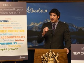 Service Alberta Minister Stephen Khan speaks to media about the new Bill 9 on condominiums at the Alberta Legislature in Edmonton on Dec. 2, 2014.