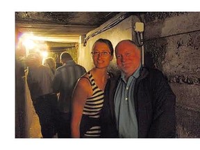 Edmonton nurse Bonnie Woloschuk and Nick Lees explore a tunnel used by Canadian troops in the First World War during a visit to France.