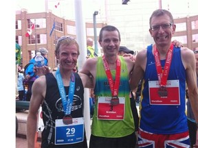 Simon Stewart, 41, of Edmonton, left, ran the half marathon Sunday. Brendan Lunty, 36, of Camrose, centre, and Dave Coales, 44, from England, did the full 42 kilometres.