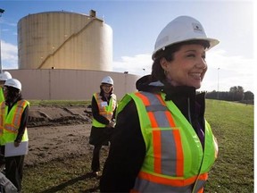 British Columbia Premier Christy Clark smiles during a tour before a groundbreaking event for FortisBC's Tilbury LNG facility expansion project in Delta, B.C., on Tuesday October 21, 2014.