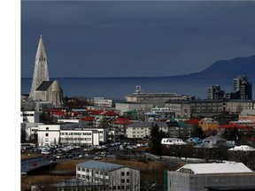 Buildings surround the Hallgrimskirkja tower in the Icelandic capital on April 7, 2014 in Reykjavik, Iceland. Reports Saturday morning indicated that another volcano might be erupting in the northern island country.