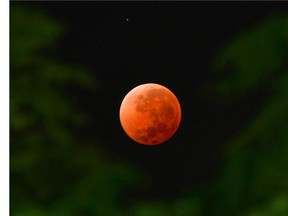 The moon is seen in the time around a total lunar eclipse on April 15, 2014 in Montevideo, Uruguay. People in most of North and South America were able to witness this year's first total lunar eclipse, which caused a 'blood moon' and was the first of four in a rare Tetrad of eclipses over the next two years.