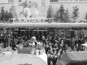 Old St. Nick prepares to exit his sliegh at the end of the 1946 Eaton’s Santa Claus  Parade and head for Eaton’s Toyland where kids could tell him what they wanted  for Christmas.