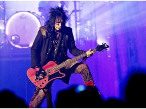 Nikki Sixx of Motley Crue performs at Rexall Place on Nov. 18, 2014.