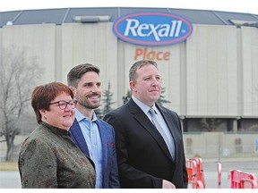 Northlands president Tim Reid, right, Andrew Ross, arena strategy committee chair and Northlands chair Laura Gadowsky announce a plan Friday to consider Rexall's future.