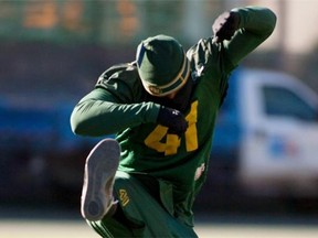 Odell Willis of the Eskimos jumps in the air during a play during practice at Commonwealth Stadium in Edmonton on Thursday, Sept. 11, 2014.