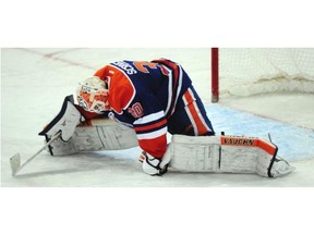 Oilers’ goalie Ben Scrivens lets in his third goal during Edmonton’s game against the Vancouver Canucks at Rexall Place on Wednesday, Nov. 19, 2014.