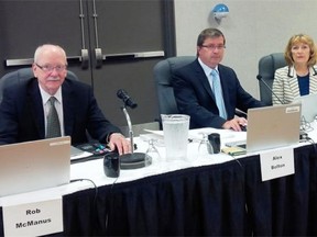 File photo of Bob McManus, left, Alex Bolton and Christine Mackin, at a hearing at Lister Hall on the University of Alberta campus. In its first pipeline decision, the Alberta Energy Regulator had some pointed criticism of TransCanada for not looking seriously for alternative routes to resolve conflicts, for meeting only minimum standards and not completing some aspects such as a caribou recovery plan.