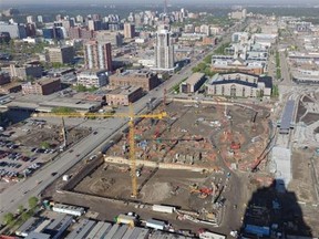 David Staples writes: Edmonton's downtown is exploding in a way we haven’t seen in two generations. Business and civic leaders trumpet new projects in rapid succession — an arena here, a museum there, LRT, condos and office towers everywhere. Downtown is a sky of cranes, a ground split by shovels. New taxes from new projects will spray a firehose of cash for new parks and storm sewers and to spruce up hideously bland downtown streets. [Note: This image was created by stitching multiple pictures together]