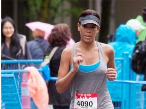 Phoebe Dey, 41, will be running the Edmonton half marathon. This photo was taken during the last 500 metres of her first marathon in Vancouver this May.