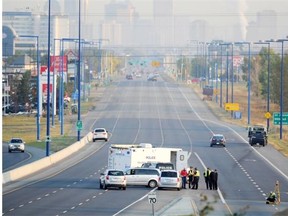 Police investigate a fatal pedestrian accident at Gateway Boulevard north of 23rd Avenue in Edmonton on Wednesday, Sept. 17, 2014. (John Lucas/Edmonton Journal)