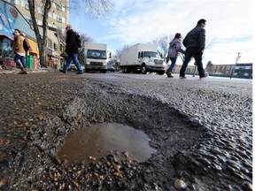 A pothole at 82nd Avenue and 105th Street in Edmonton on Feb. 5, 2013.