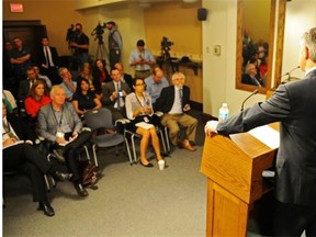 Premier Jim Prentice addresses reporters in the legislature media room earlier this month.