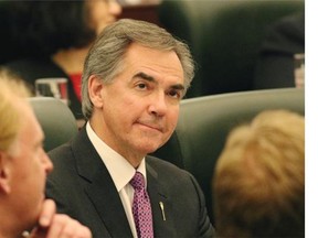 Premier Jim Prentice is welcomed to the Alberta Legislature just before the throne speech was delivered on Nov. 17, 2014.