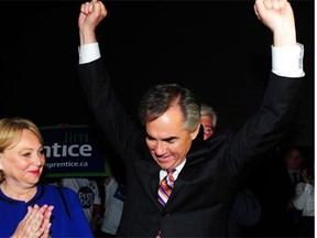 Jim Prentice and his wife Karen celebrate as the results of his victory are announced at the PCAA in Edmonton, September 6, 2014.