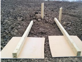 A road sign marking the traditional territory of the Treaty 8 First Nations was cut in half by vandals.