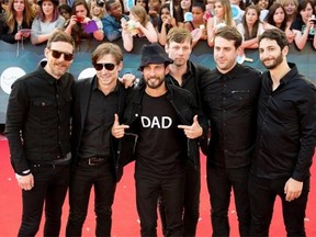 The Sam Roberts Band arrives on the red carpet at the Much Music Video Awards in Toronto, Sunday June 15, 2014.