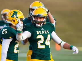 Ryan Migadel and the Alberta Golden Bears get a chance at redemption against the University of Calgary Dinos on Saturday, Oct. 18, 2014.